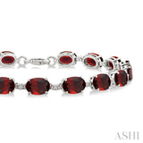7X5 MM Oval Shape Garnet and 1/10 Ctw Single Cut Diamond Semi-Precious Bracelet in Sterling Silver