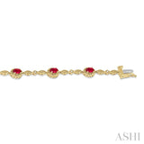 5x3 MM Oval Cut Ruby and 1/20 Ctw Single Cut Diamond Bracelet in 10K Yellow Gold