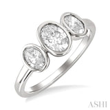 1 Ctw 3-Stone Bezel Set Oval Cut Diamond Ring in 14K White Gold