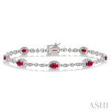 5x3 MM Oval Cut Ruby and 1/20 Ctw Round Cut Diamond Bracelet in 10K White Gold