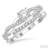 1/2 Ctw Diamond Wedding Set With 1/3 Ct Round Center Diamond Twisted Engagement Ring and 1/10 Ct Wedding Band in 14K White Gold