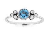 Bezel Set Blue Topaz Ring with Diamond Accents