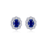 SS Oval Lab Grown Blue Sapphire Earrings with Round Simulated Diamond Halo & Platinum Bonding
