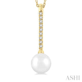 7 MM Round Shape Cultured Pearl and 1/10 Ctw Petite Round Cut Diamond Fashion Pendant With Chain in 10K Yellow Gold