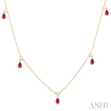 5x3 MM Pear Shape Ruby and 1/8 Ctw Round Cut Diamonds Precious Station Necklace in 10K Yellow Gold