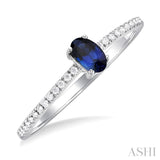 5x3 MM Oval Cut Sapphire and 1/10 Ctw Petite Round Cut Diamond Precious Fashion Ring in 10K White Gold