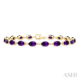 6X4 MM Oval Cut Amethyst and 1/6 Ctw Round Cut Diamond Semi-Precious Tennis Bracelet in 10K Yellow Gold